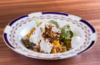 Smoked burrata with golden beetroot, grains and pickled greengages