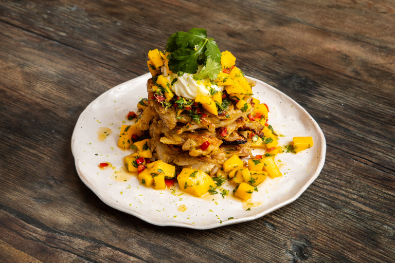 Ras el hanout sweet onion fritters with poached eggs and chilli-mango chutney