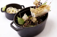 Fennel-smoked Alaska black cod with warm bean salad
