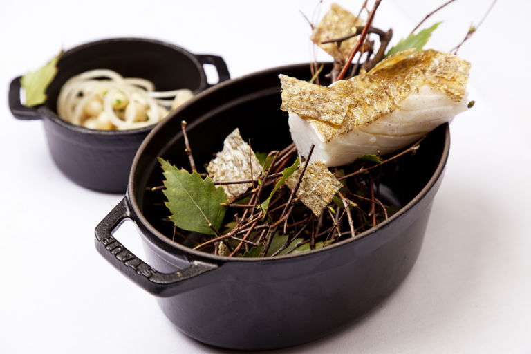 Fennel-smoked Alaska black cod with warm bean salad