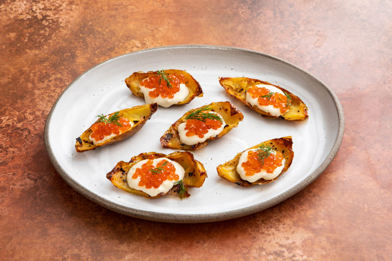 Potato skins with whipped cod’s roe and caviar 