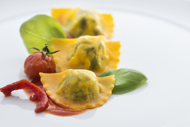 Ravioli with sheep's milk ricotta, spinach, tomato sauce and basil
