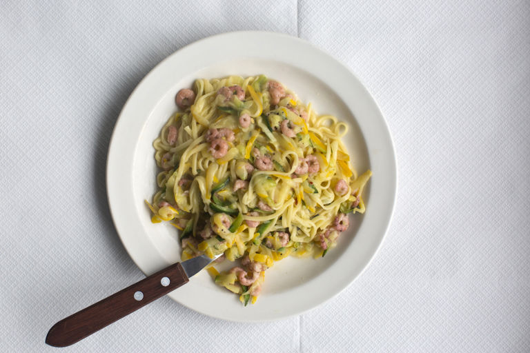 Tagliarini with raw green and yellow courgette, brown shrimp, chilli and lemon