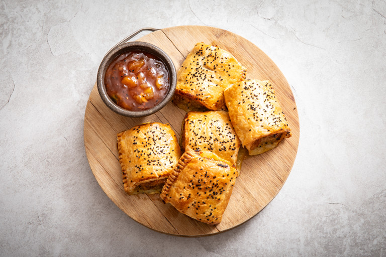 Goan-inspired sausage rolls with mango chutney