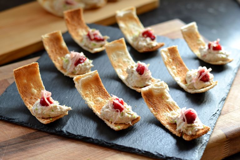 Smoked mackerel pâté with cranberry, lime and ginger on Melba toasts