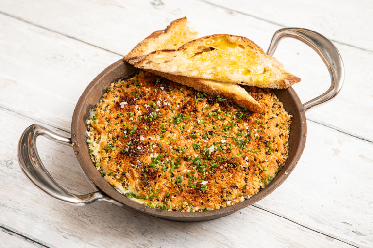 Maryland-style crab dip with crispy sesame panko and chives