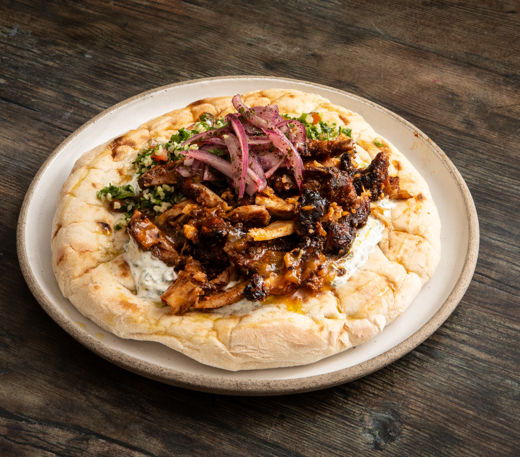 Apricot and chipotle glazed chicken shawarma with tabbouleh and sumac onions