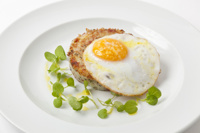 Smoked bacon hash with a fried duck egg