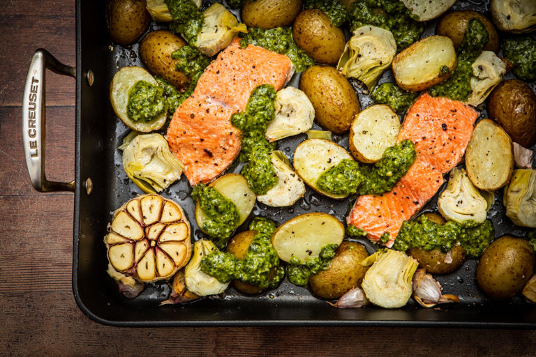 Roasted salmon and artichokes with pumpkin seed pesto
