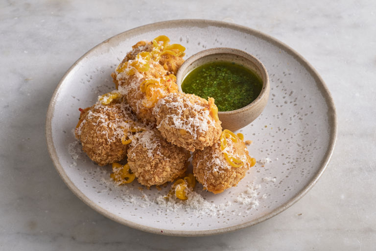 Panko fried chilli cheese bites with parsley oil dip