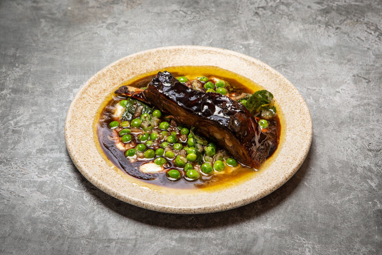 Smoked lamb ribs, glazed in reduced wine, yoghurt and peas