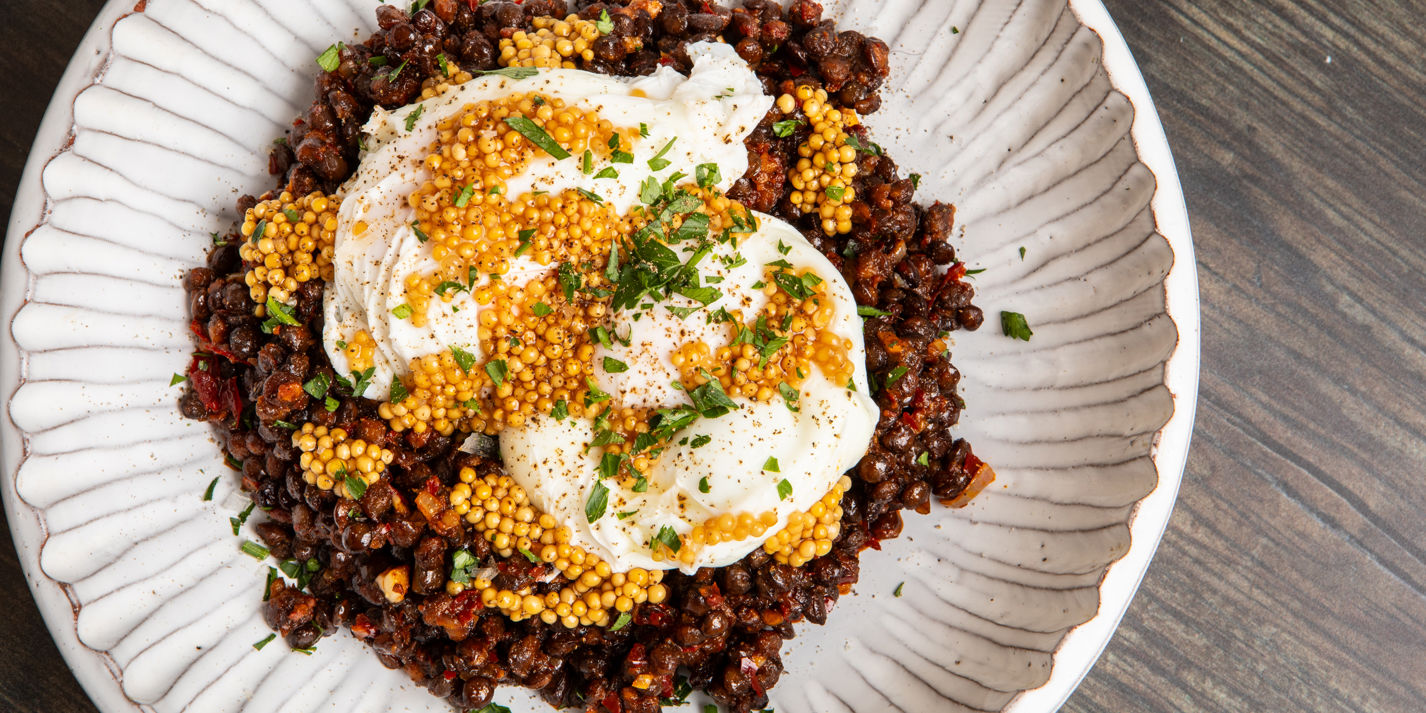 Smoky Harissa Lentils with Poached Eggs and Pickled Mustard Seeds Recipe - Great British Chefs