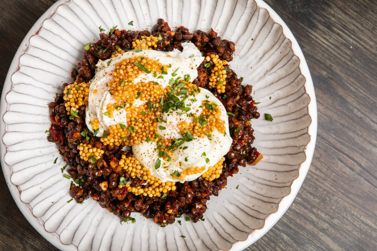 Smoky harissa lentils with poached eggs and pickled mustard seeds