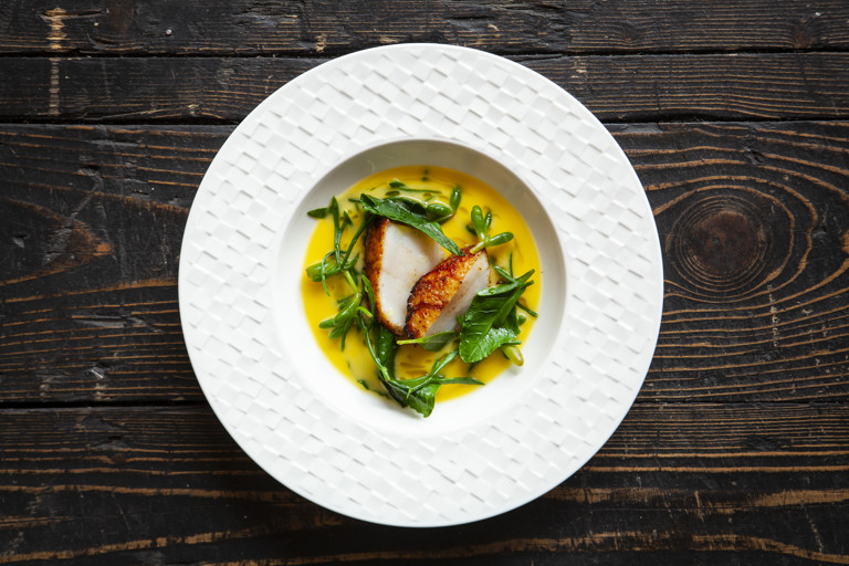Roasted scallop with whey butter and sea herbs
