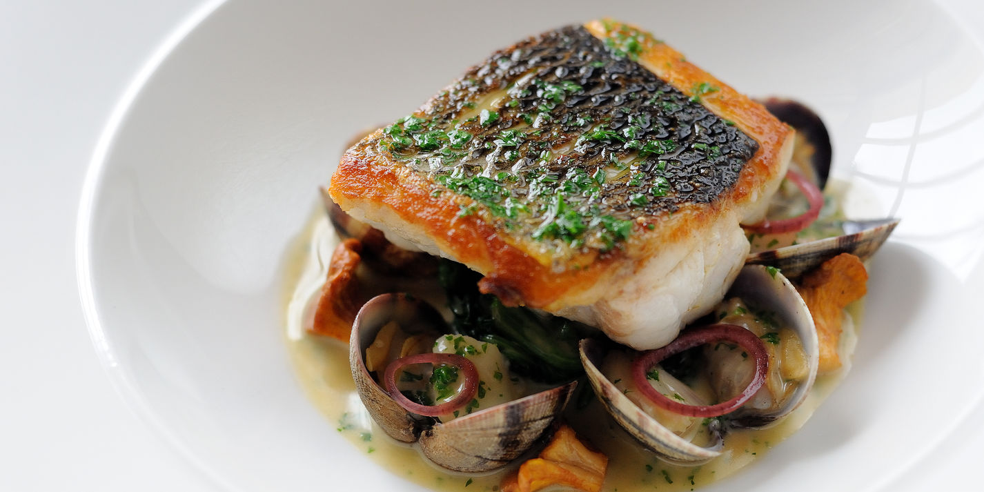 Sea Bass Recipe With Clams & Poached Cod Cheeks - Great British Chefs