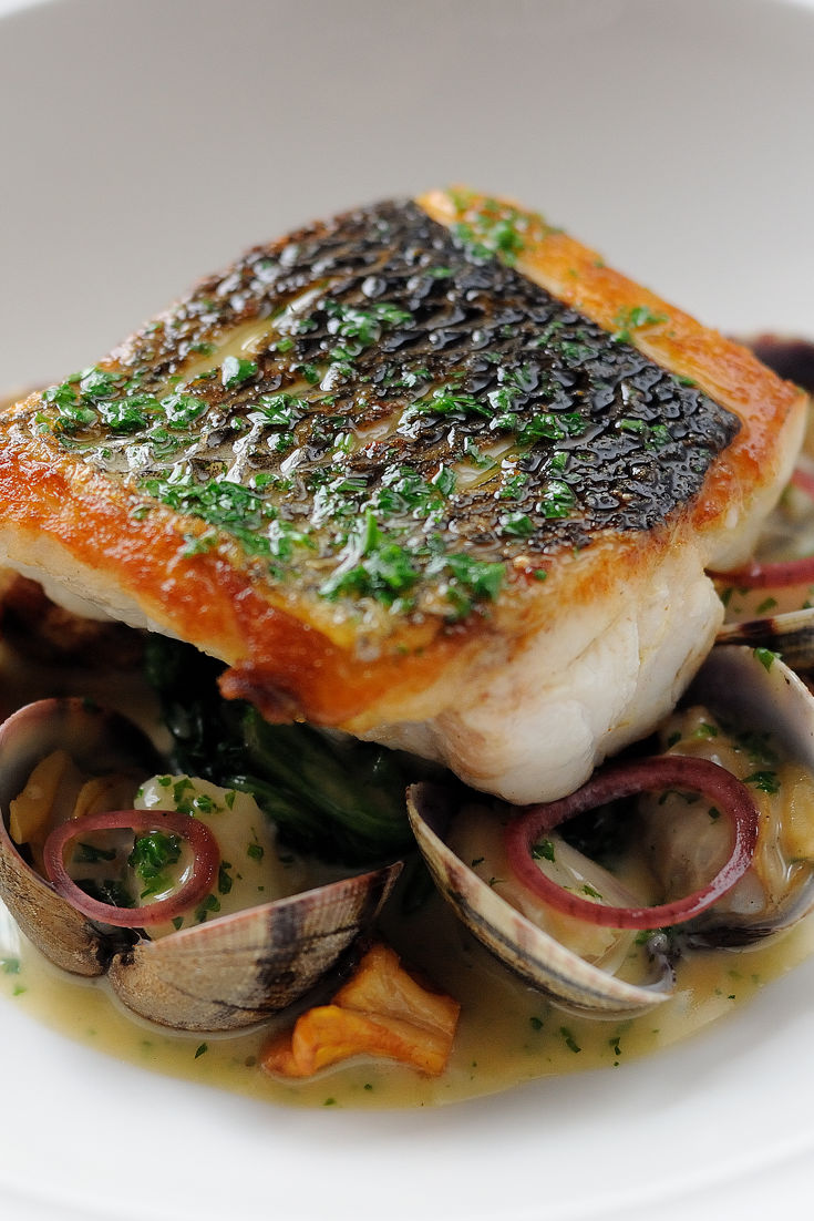 Sea Bass Recipe With Clams & Poached Cod Cheeks - Great British Chefs