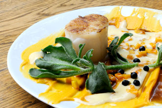 Confit line-caught cod with juniper ashes, butternut squash and liquorice sabayon