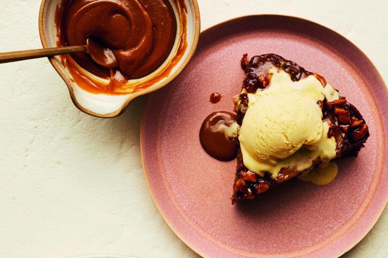 Upside-down sticky pear and walnut cake