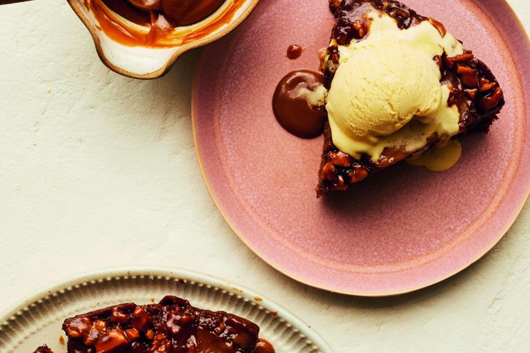 Upside-down sticky pear and walnut cake