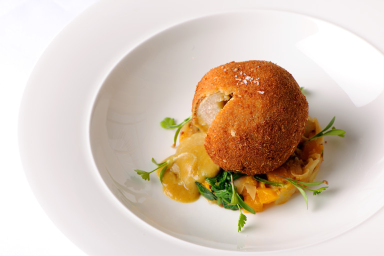 Curried chicken Kiev with squash sag aloo