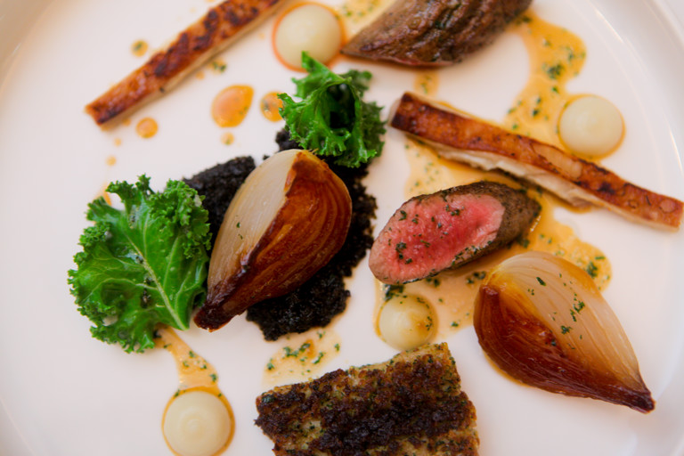 Fillet, shoulder and belly of Welsh Lamb with kale compote, glazed Roscoff onion and lamb jus