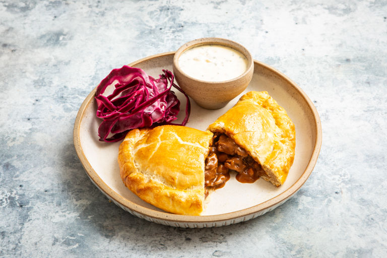 Slow cooked beef and ale pasty with horseradish cream dip and pickled red cabbage