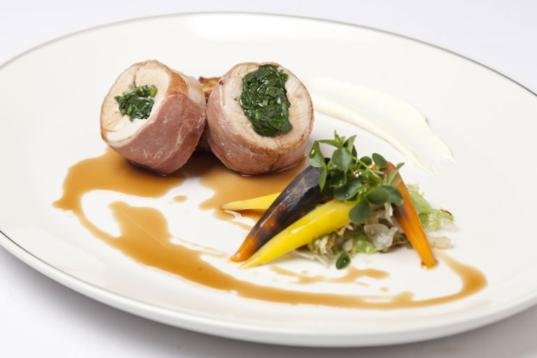 Ballotine of turkey with spinach, braised baby gems, potato rosti and thyme jus