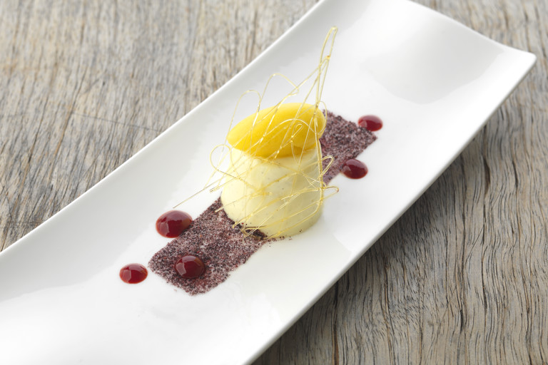 Crème fraîche panna cotta with orange and mint sorbet