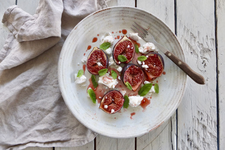 Kidderton Ash goats’ cheese with pomegranate molasses-baked figs and mint
