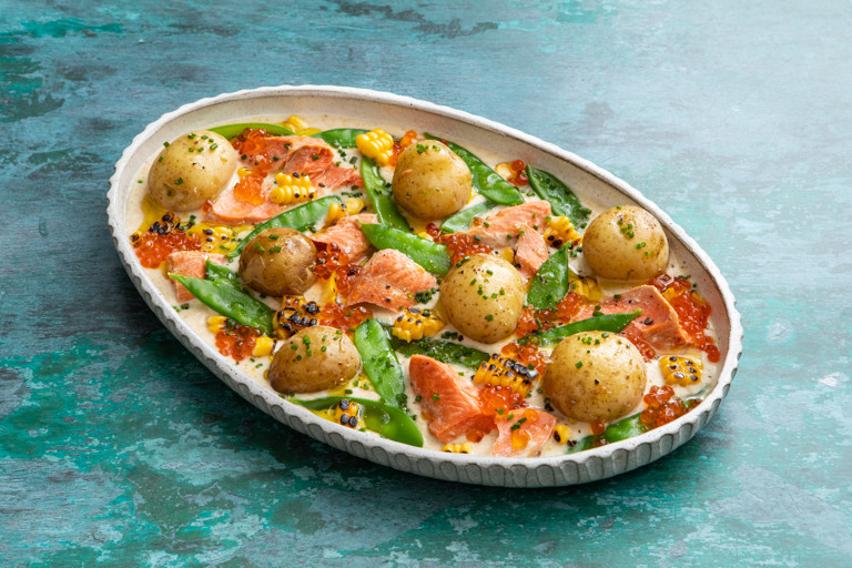 Salmon, mangetout and baby potato salad with a curried corn and salmon roe dressing