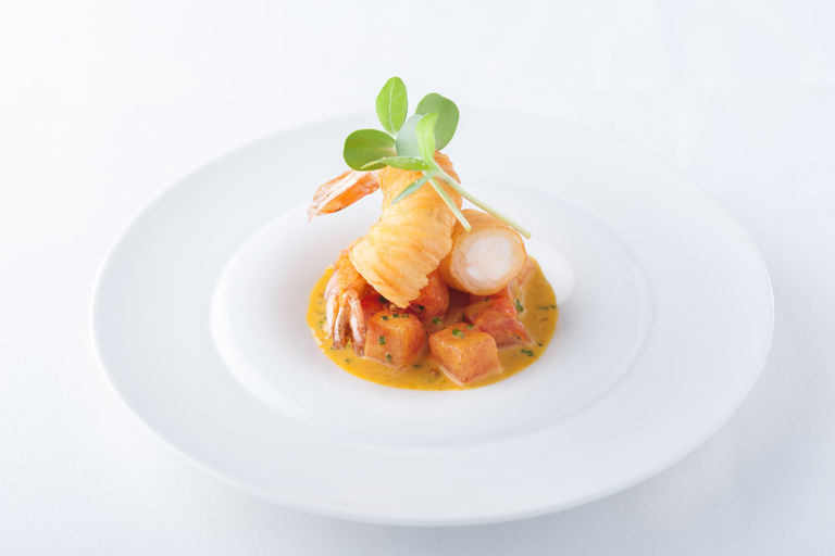 Compressed watermelon and king prawn curry