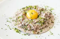 Venison tartare, umeboshi mayo, gherkin, shallot, quail egg yolk
