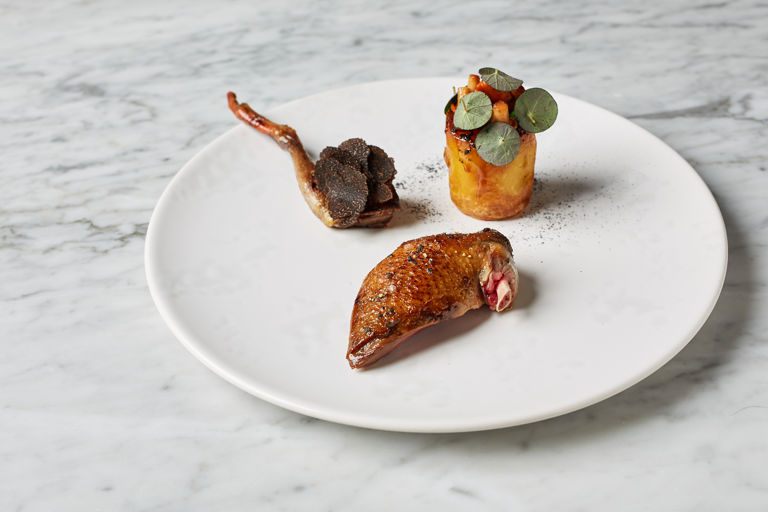 Squab pigeon with crispy rolled potato, girolles and truffle