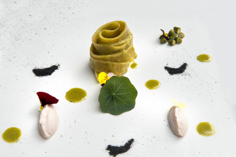 Fettuccine made of pistachios from Bronte over a mortadella and leek emulsion