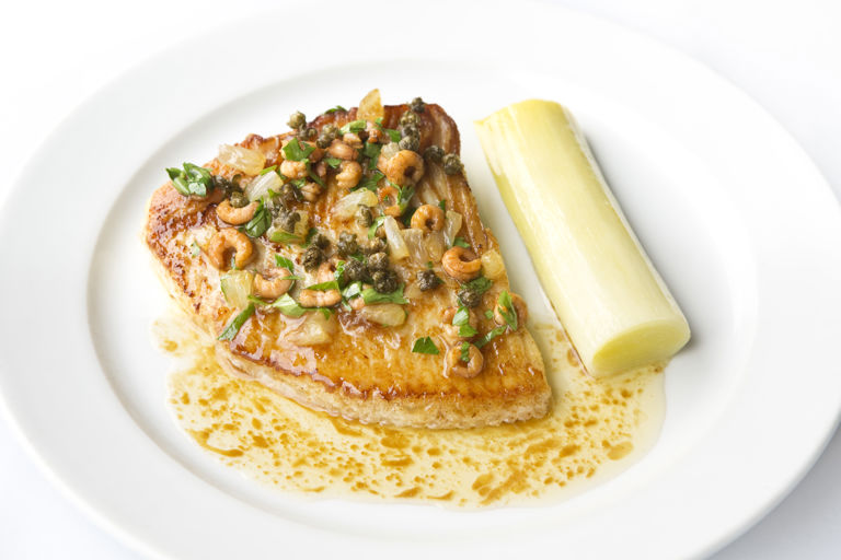 Skate wings with braised leeks and shrimp beurre noisette