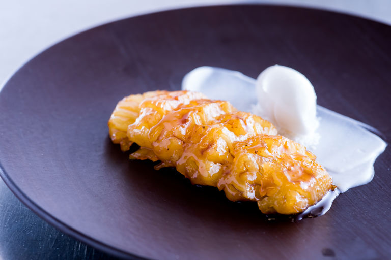 Rum-poached pineapple with coconut lime sorbet
