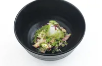 Alaska king crab with micro herb salad and tomato consommé granita