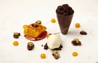 Poached pineapple, Michel Cluizel cones, cicely ice cream, rum raisin and passion fruit