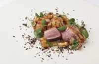 Duck breast salad with burnt coconut, pineapple and cashews