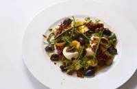 Warm egg salad with wild asparagus, olive and chilli