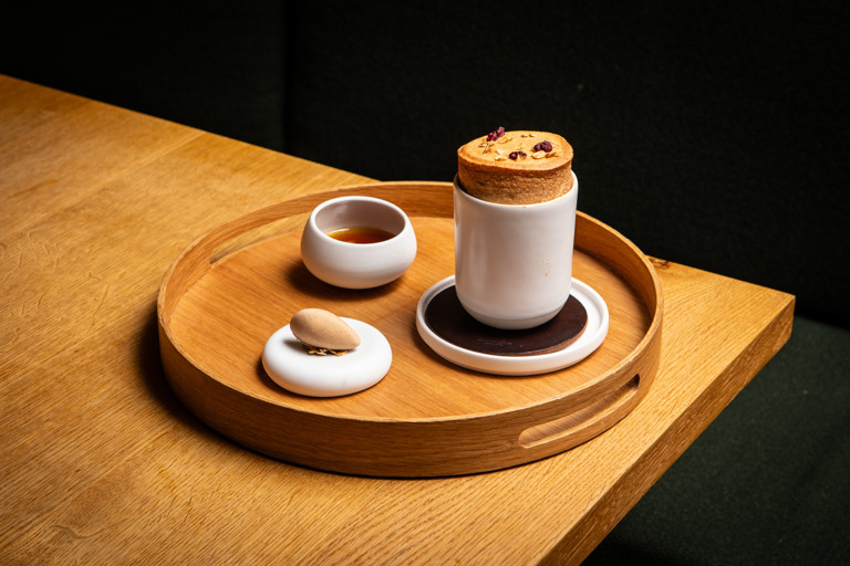 Orchard apple soufflé with red walnut and honey ice cream