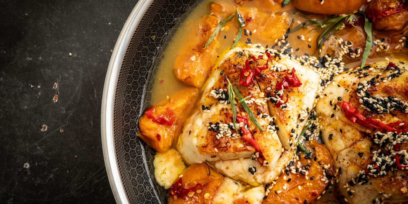 Whole Pan-Seared and Grilled Halloumi With Apricots, Habanero Hot Honey, Sizzling Sesame Seeds and T