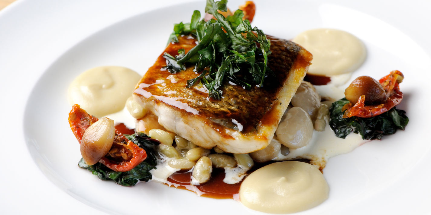 Sea bass with Jerusalem artichoke purée, roasted garlic and red wine