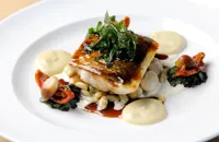 Sea bass with Jerusalem artichoke purée, roasted garlic and red wine
