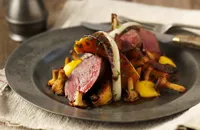 Roast loin of venison with butternut squash, girolles and roast treviso