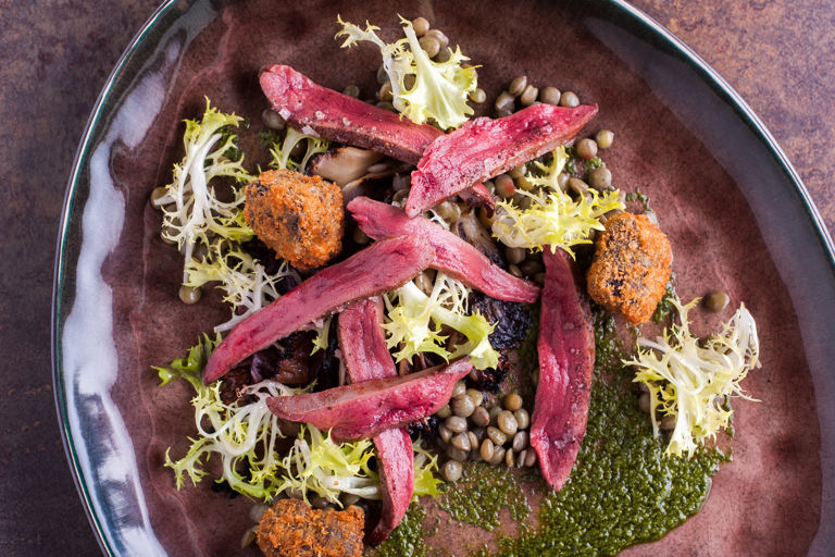 Wood pigeon breast with salsa verde and black pudding beignets