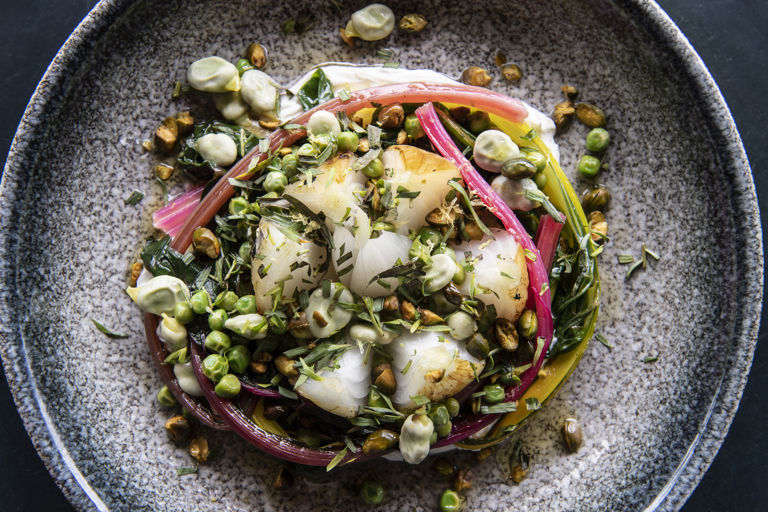 Coal-baked onion with chard, labneh and beans