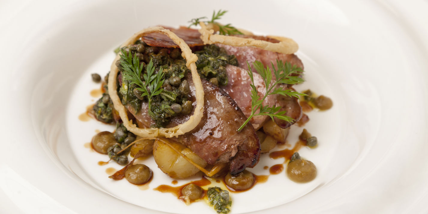 Calf's liver with sage salsa verde, caper, raisins, potatoes and crispy ham