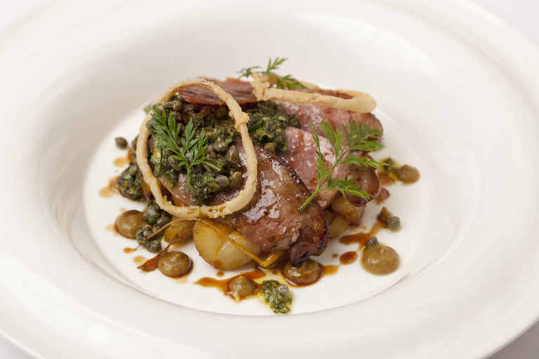 Calf's liver with sage salsa verde, caper, raisins, potatoes and crispy ham