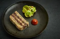 Black pudding and pork terrine with quince jam and truffled Brussels sprout salad